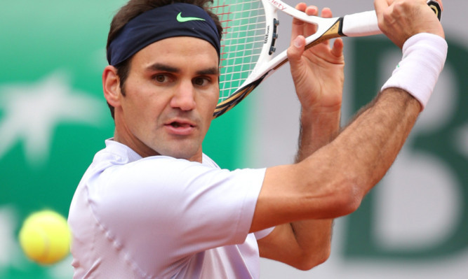 Roger Federer in action in the opening round.