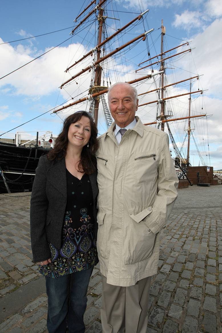 Kim Cessford, Courier - 29.07.10 - the Italian TV personality Piero Angela was on baord the RSS Discovery as part of an Italian programme about science and history featuring Ernest Shakleton - pictured beside the Discovery are l to r - Sandra Cormack (his makeup artist) and Piero Angela