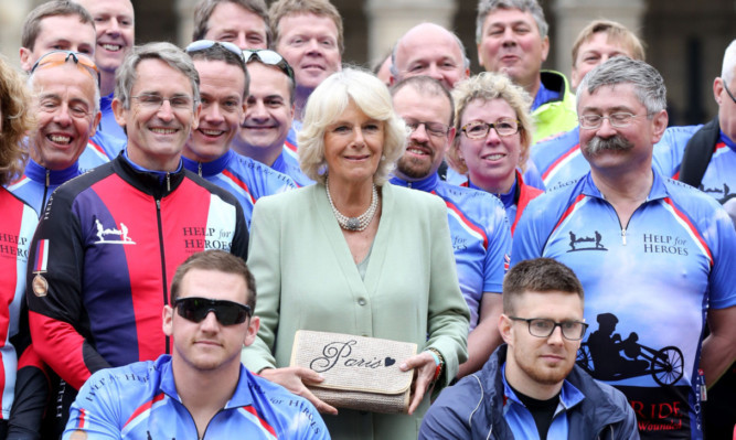 The Duchess of Cornwall in Paris with riders taking part in the Help for Heroes bike ride.