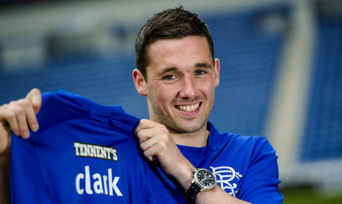 Nicky Clark has penned a three year deal with Rangers.