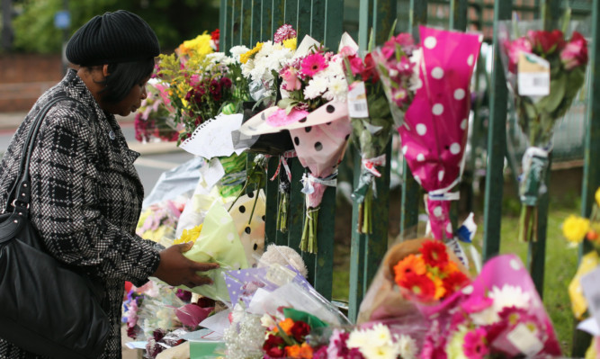 Members of the community laid flowers close to the scene where Drummer Lee Rigby was killed.