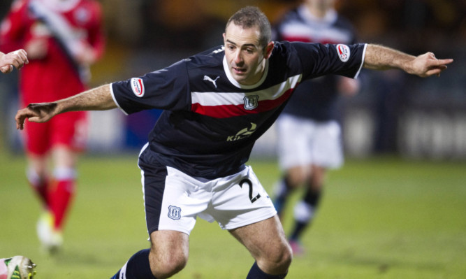 Gary Harkins in action for Dundee.