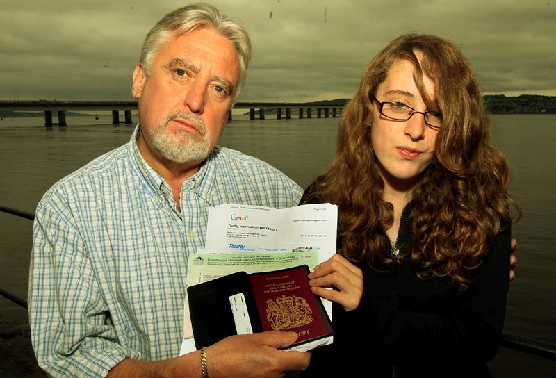 John Stevenson, Courier,30/07/10.Dundee.Jen Cosgrove story Hire Car Documentation.Pic shows Graeme Brett and his daughter Sally with the documentation he brought to hire a car,and was refused.