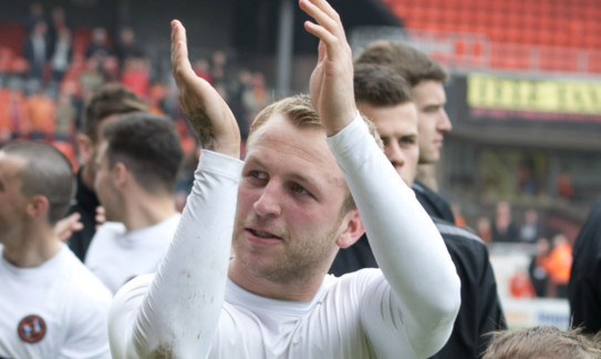 Johnny Russell saluting the United fans at the last home game of the season.