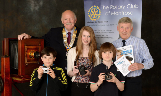 Elliot Scott, Kayleigh Ligertwood and Dean Scott with, at back, Montrose Rotary president Chris Hardy and Neil Werninck.