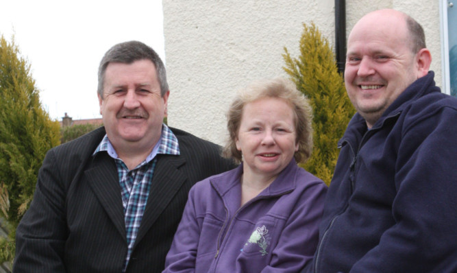 From left: John McCrank, Joan Mesney and Kevin Barthorpe at Bruce Road Community Flat.