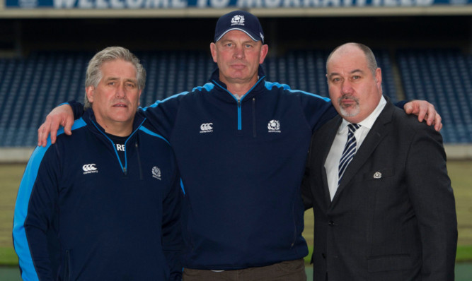 Coach Cotter, centre, is welcomed to Murrayfield by SRU chief executive Mark Dodson, right, and director of rugby Scott Johnson.