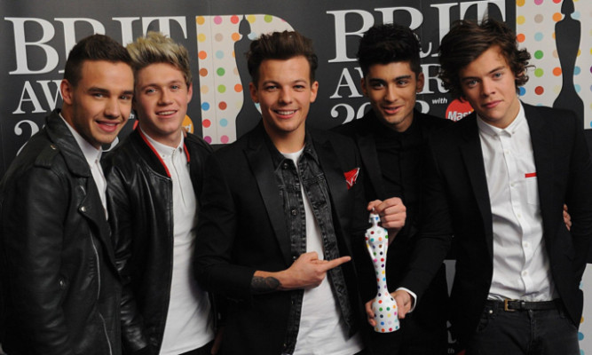 Grimshaw says One Direction don't fit the bill for Glastonbury.