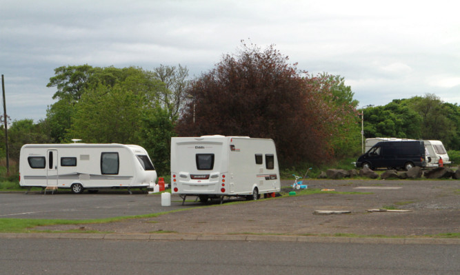 Travellers have parked up next to Dundee Ice Arena at Camperdown.