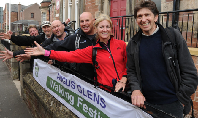 Stephen O'Kane, Norman Greig, Ben Robertson, Mike Nairn, Karen Morrison and Dave Wilson outside Kirriemuir Town Hall on their return from the first day of the walking festival.