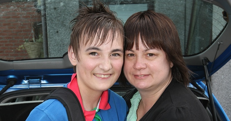 Nathan Buik, who has hypertrophic cardiomyopathy, sets off for the treatment he requires - he is pictured loading up the car with some of his luggage at home, Dundee, with his mum Linda Buik.