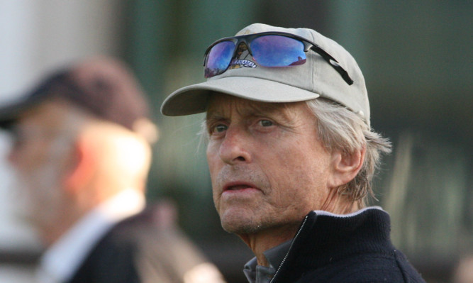 Michael Douglas playing in the Dunhill Links Championship at Carnoustie in 2011.