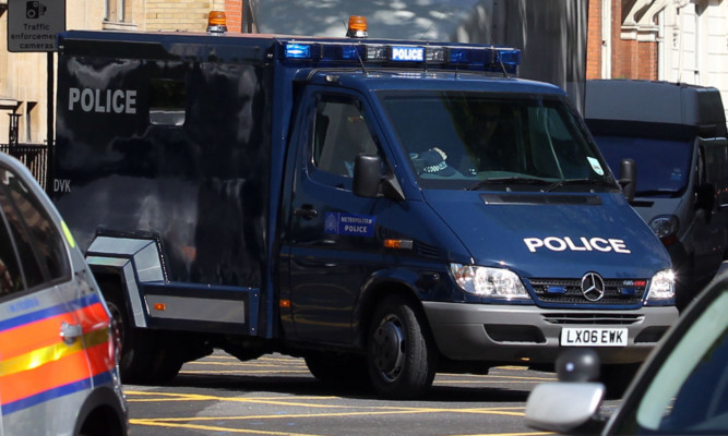 The van believed to be carrying Michael Adebolajo arrives at Westminster Magistrates' Court.