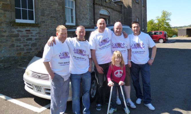 Niamh Horton with the five prison officers from Castle Huntly, who are walking the East Highland Way to fundraise for her.