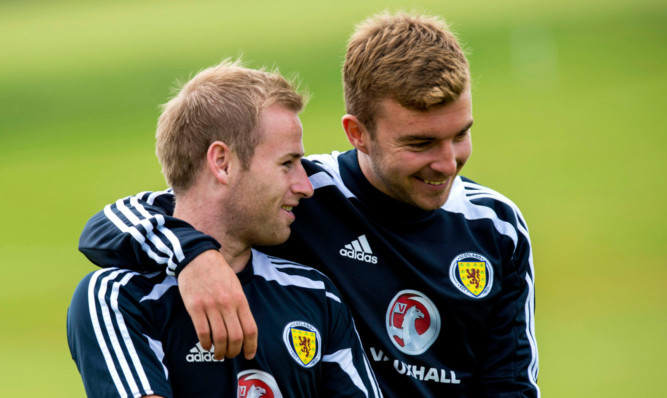 Scotland team mates Barry Bannan and James Morrison (right) are in high spirits during training.