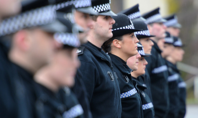 Kim Cessford - 08.03.13 - pictured at the final 'passing out' parade of Police recruits ahead of Police Scotland forming at the Scottish Police College,Tulliallan, Kincardine - part of the parade