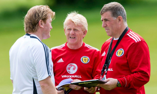 Scotland manager Gordon Strachan (centre) chats with assistant Mark McGhee and Stuart McCall (left).