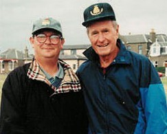 Mr Roy, left, with US President George H.W Bush.