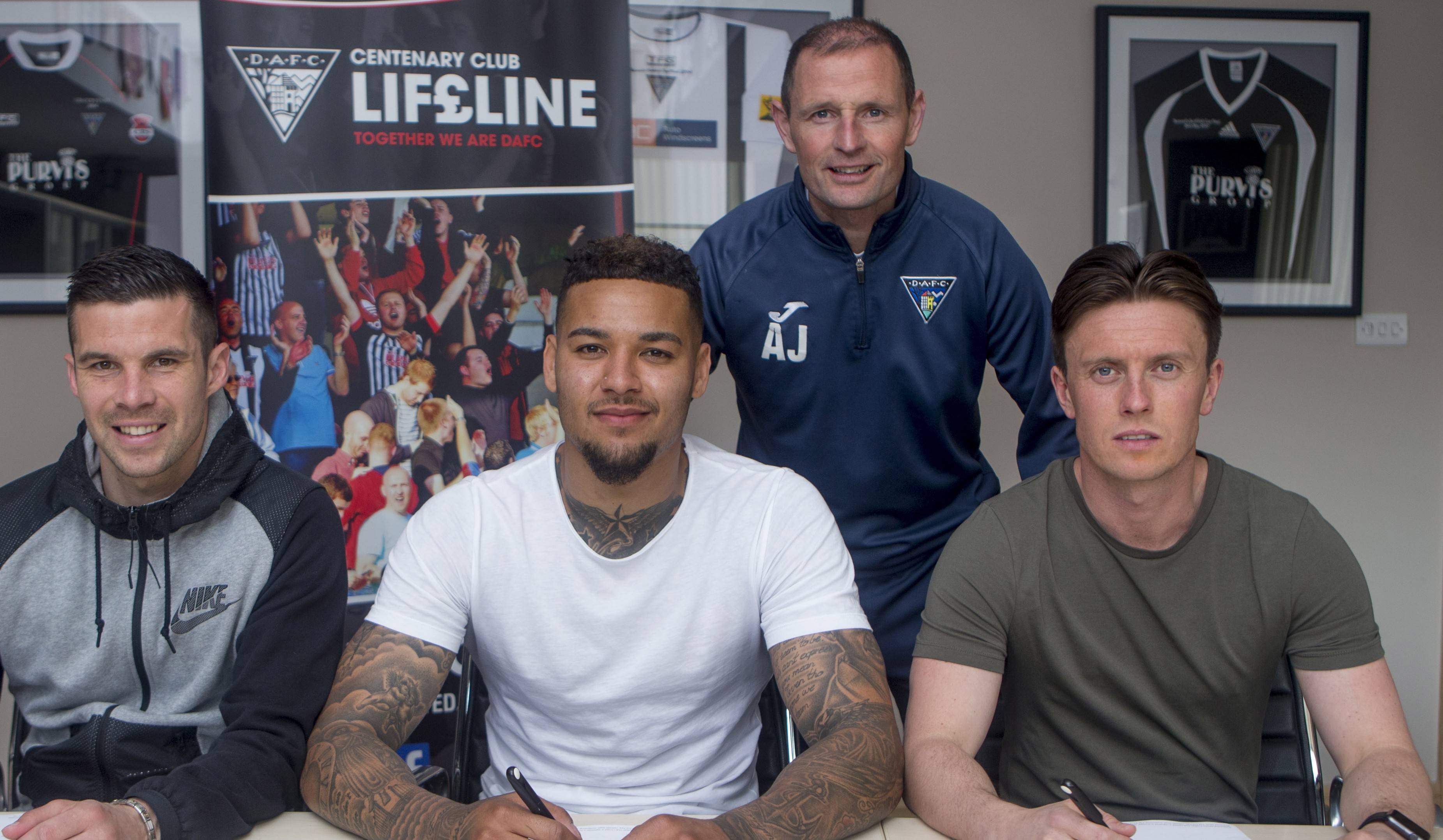 Dunfermline manager Allan Johnston with from left to right, Jason Talbot, Ben Richards-Everton and Joe Cardle.