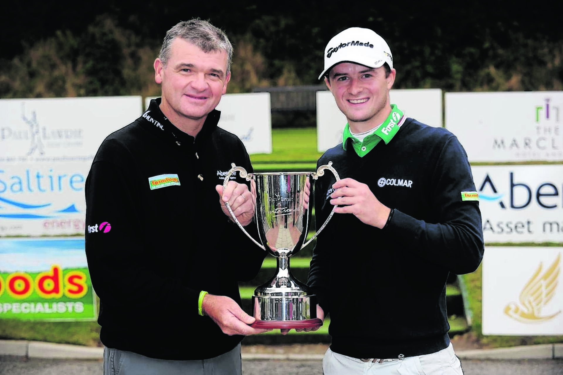 David Law (right) with mentor Paul Lawrie.