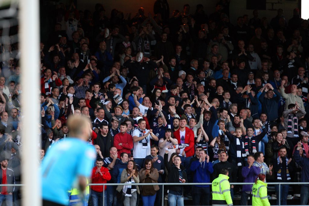 Dundee fans celebrate.