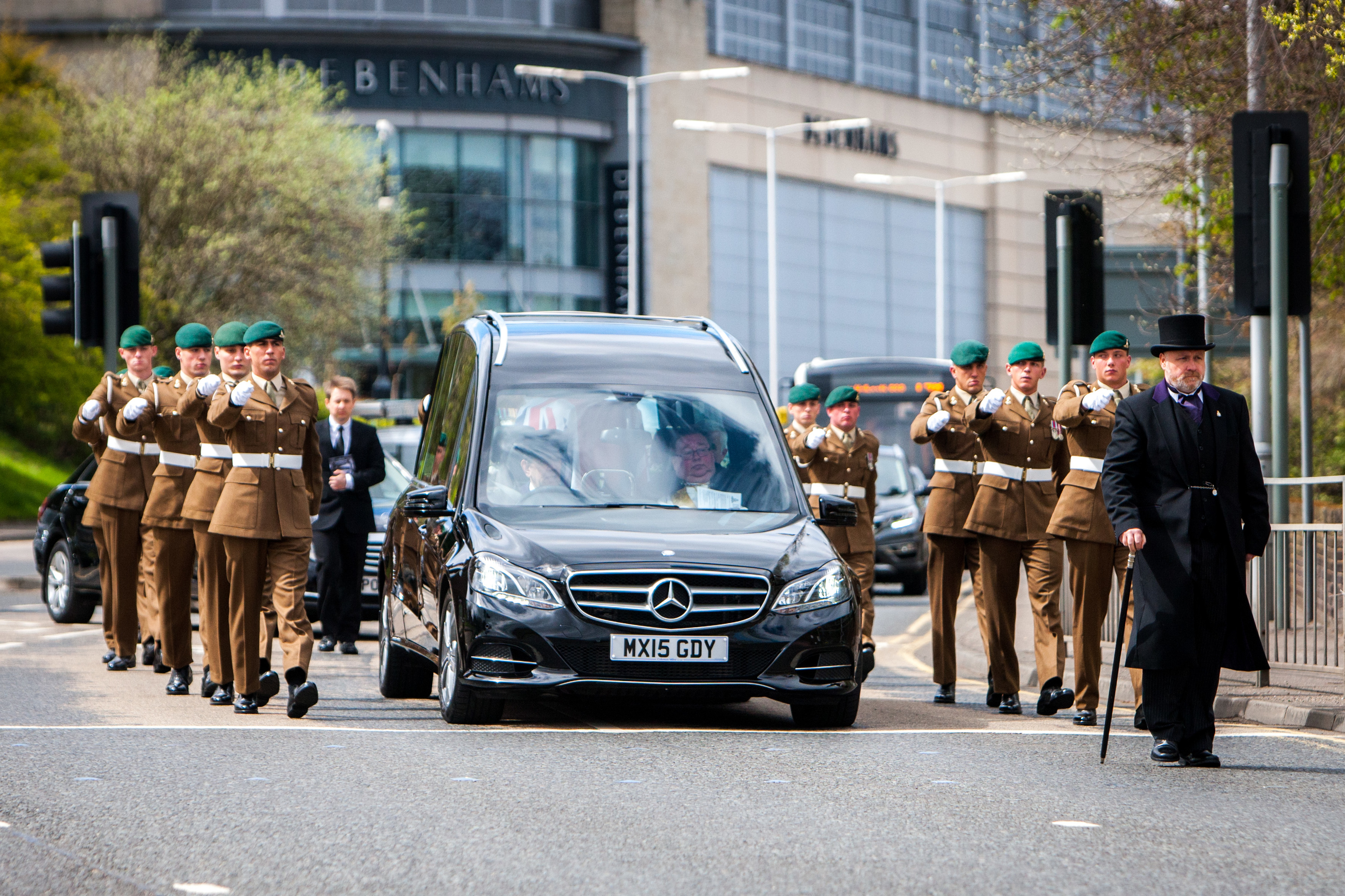 Captain David Seath's coffin makes its way to Dunfermline Cemetery.