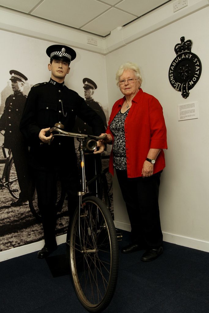 Kirriemuir Heritage Trust chairwoman Heidi Findlay with an old police bike.