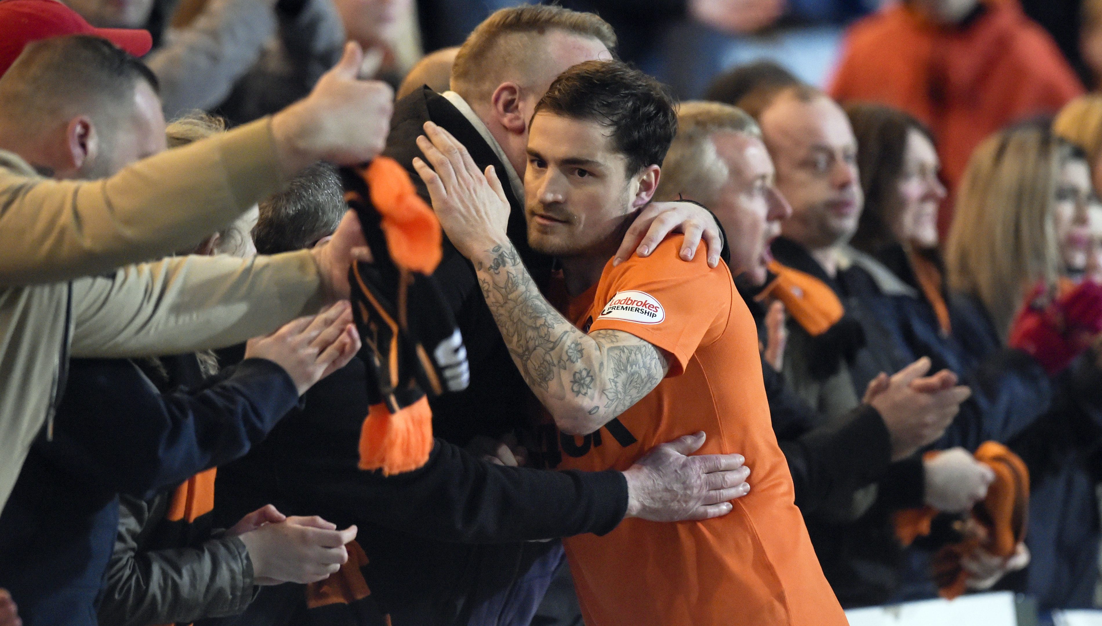 Paul Paton with United fans.