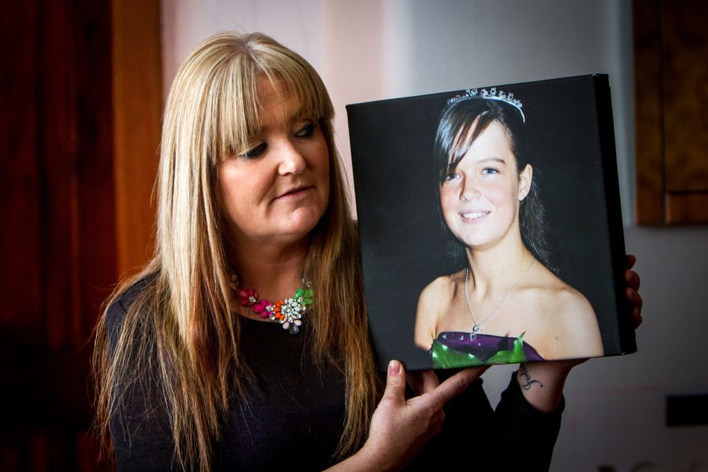 Tracy Swan with a picture of her daughter Jodie McNab.