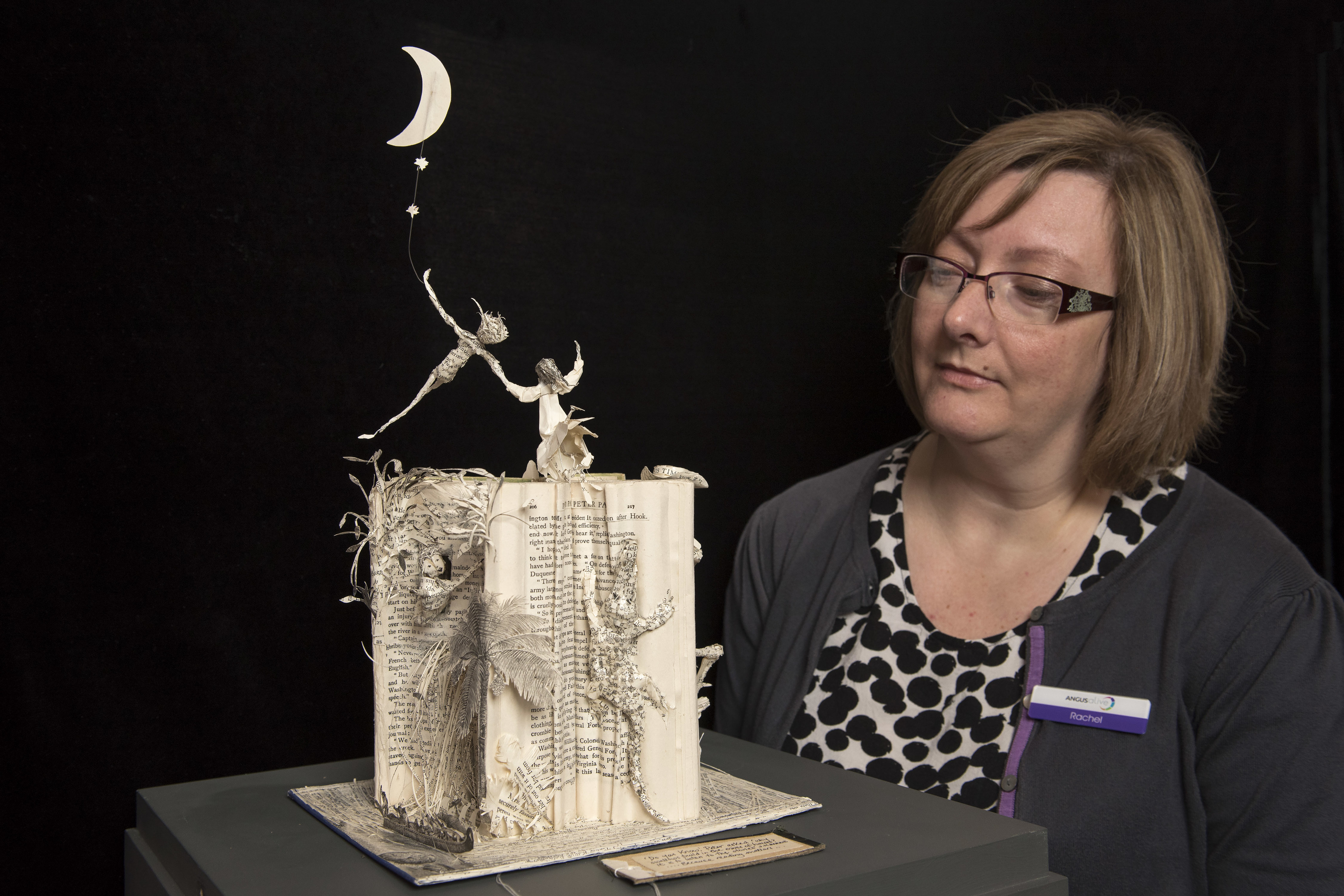 Rachel Jackson with the Peter Pan book sculpture now on loan to the Gateway to the Glens Museum.