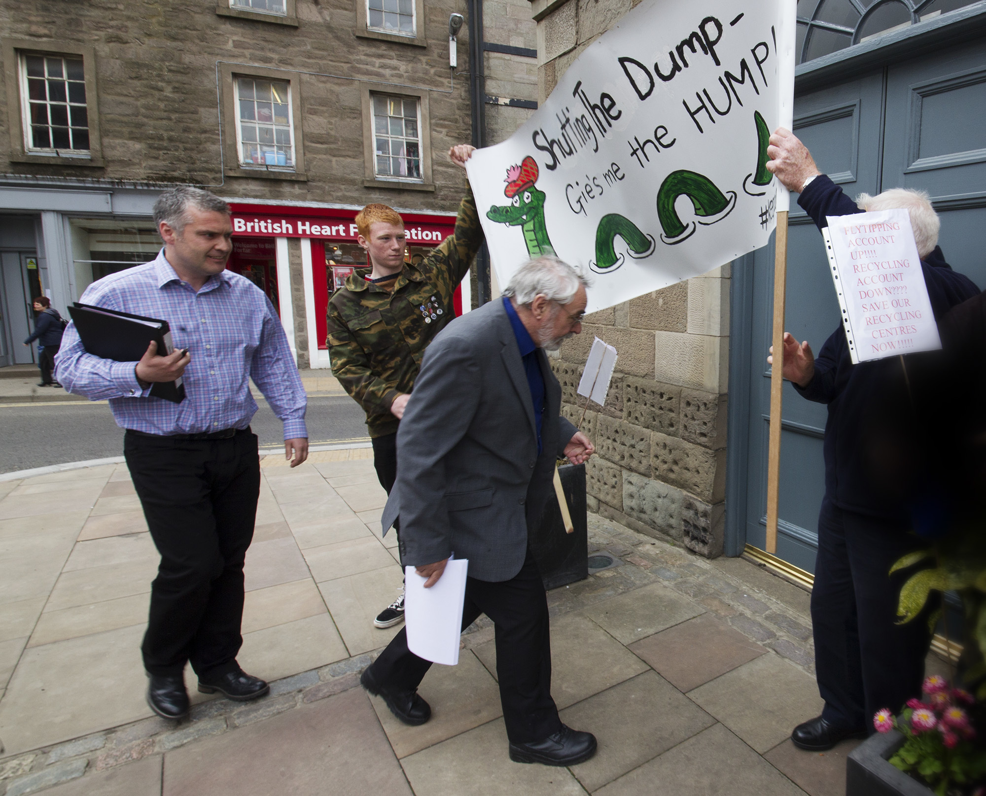 Protests took place at Town and County Hall over the planned recycling cuts.