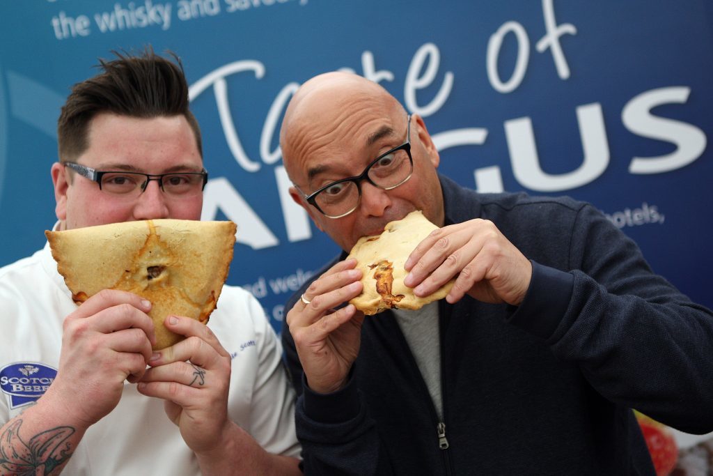 Top chef Jamie Scott and Gregg Wallace with a Forfar bridie at Dundee Flower and Food Festival.