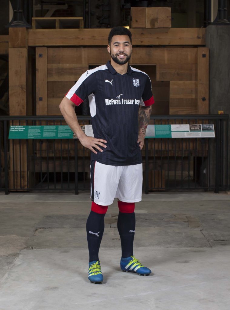 DundeeÕs Kane Hemmings models the club's 2016-17 home kit