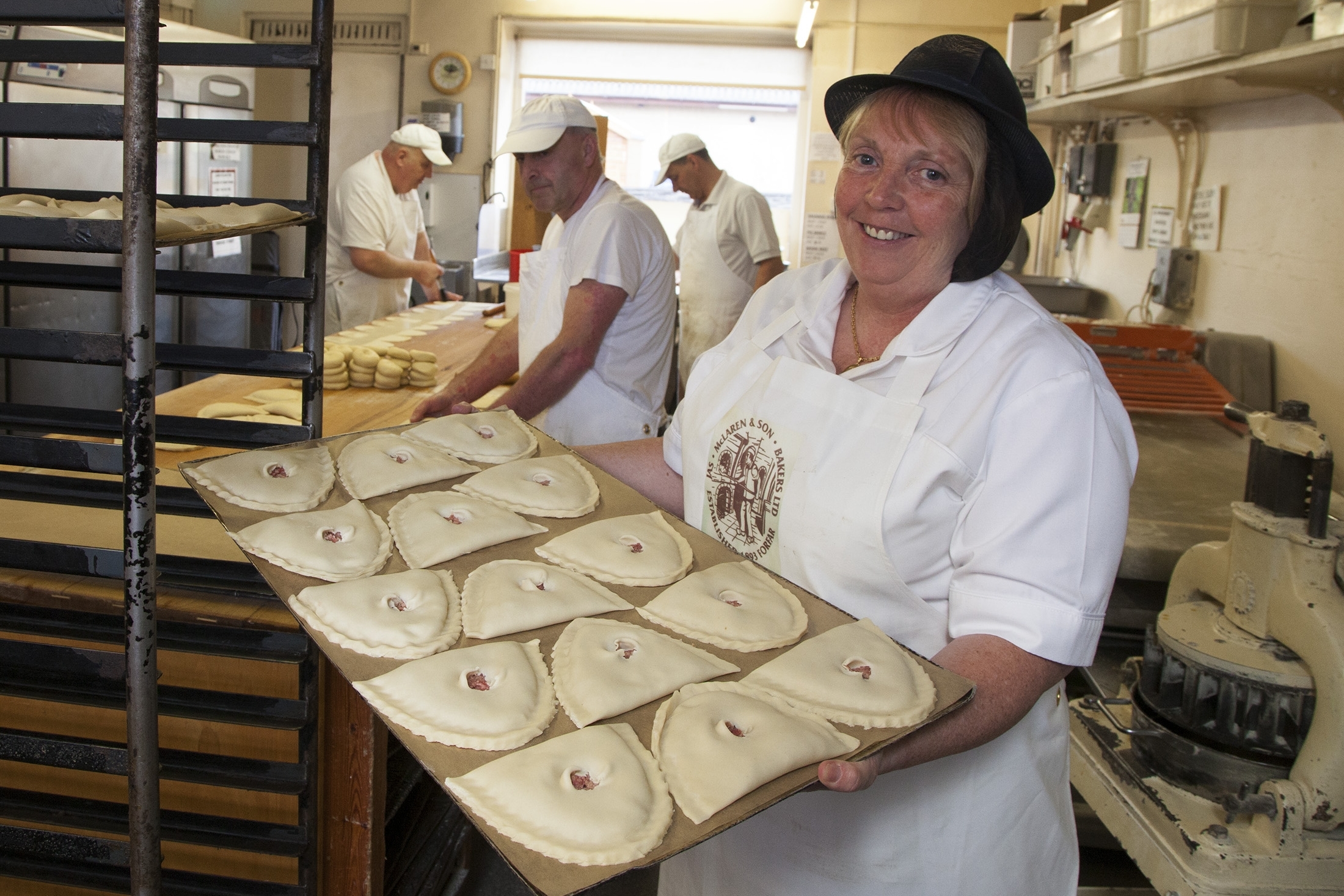 Karen Murray prepares to put a batch of Forfar Bridies in the oven at  McLaren's.