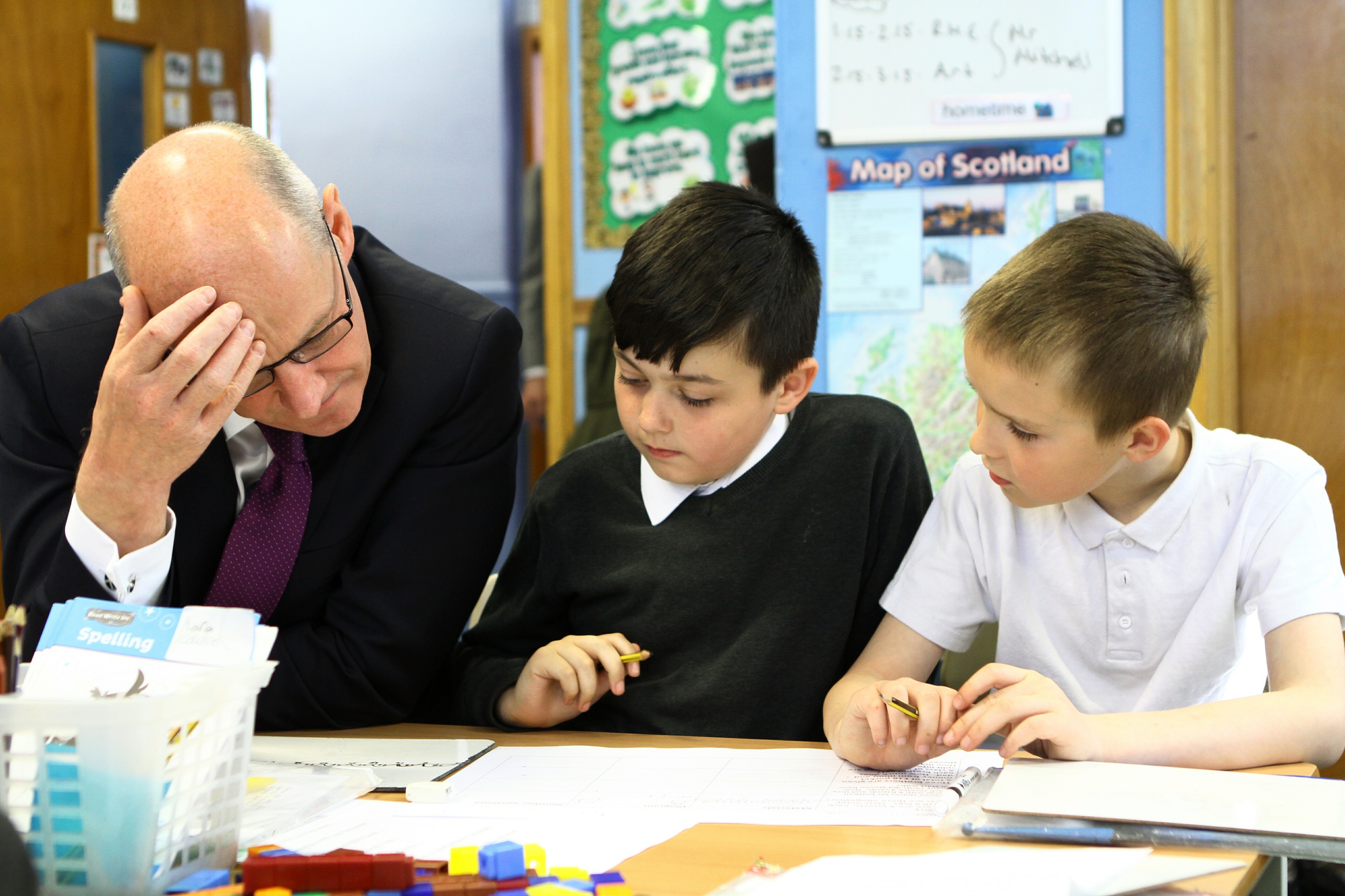 John Swinney chats to some of pupils in the P4 maths class at Dundee's Dens Road Primary School