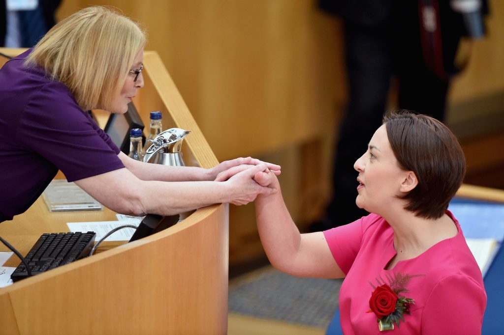 Scottish Labour leader Kezia Dugdale shakes hands with Presiding Officer Tricia Marwick.