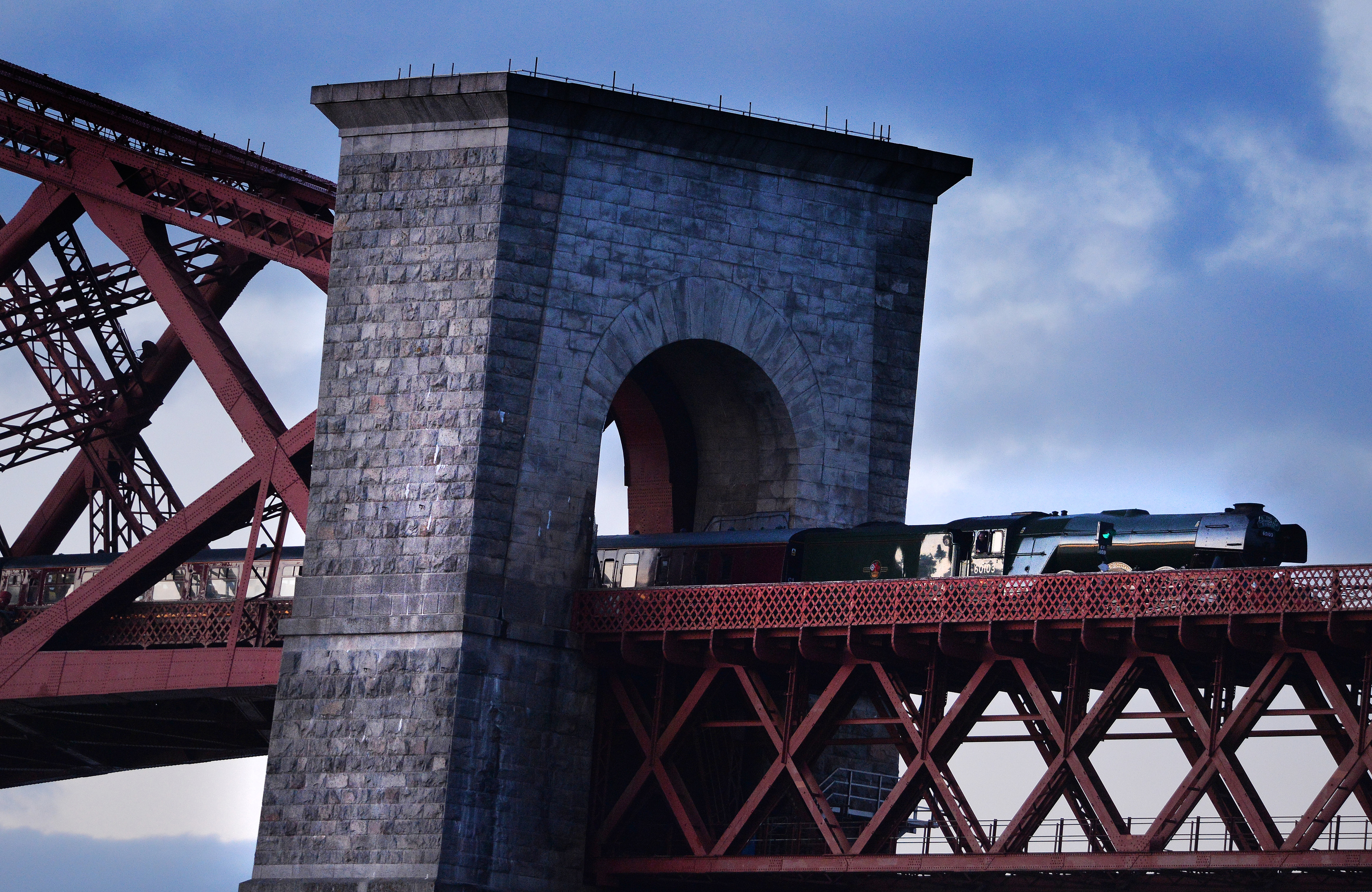 The Flying Scotsman crosses the Forth Rail Bridge as it makes its way back from Fife.