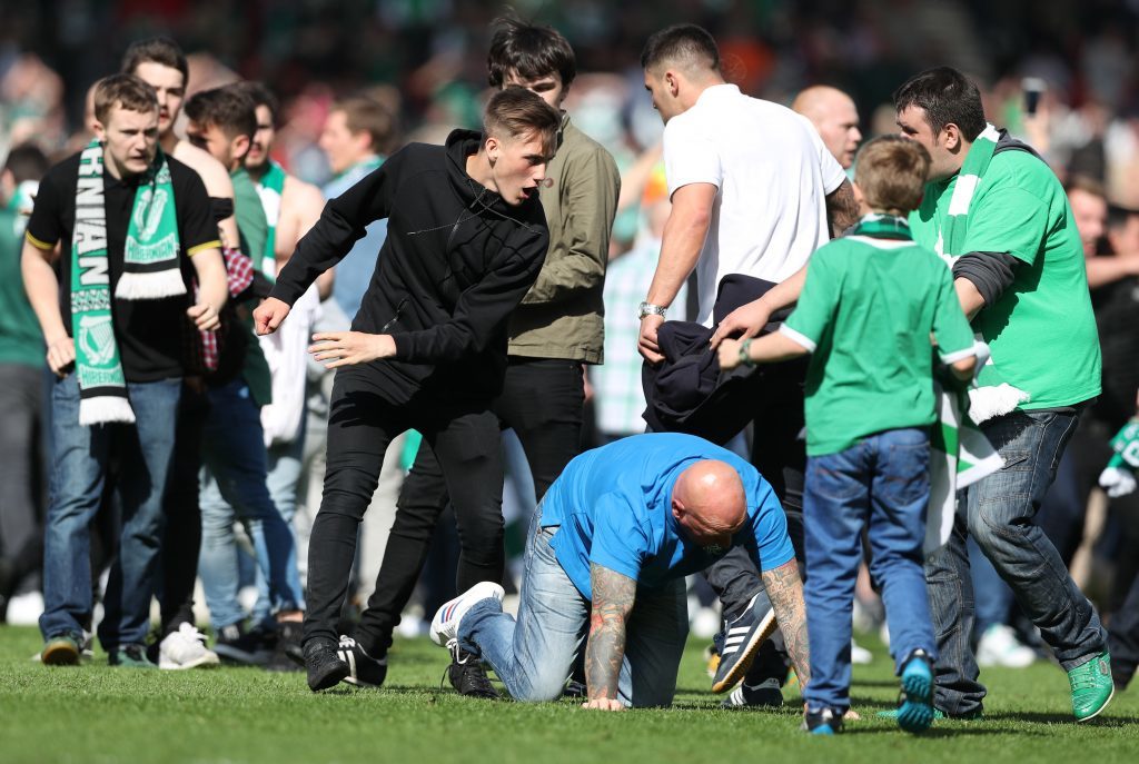 GLASGOW, SCOTLAND - MAY 21: Fans fight on the pitch during the Scottish Cup Final between Rangers and Hibernian at Hampden Park on May 21, 2016 in Glasgow, Scotland. (Photo by Ian MacNicol/Getty)