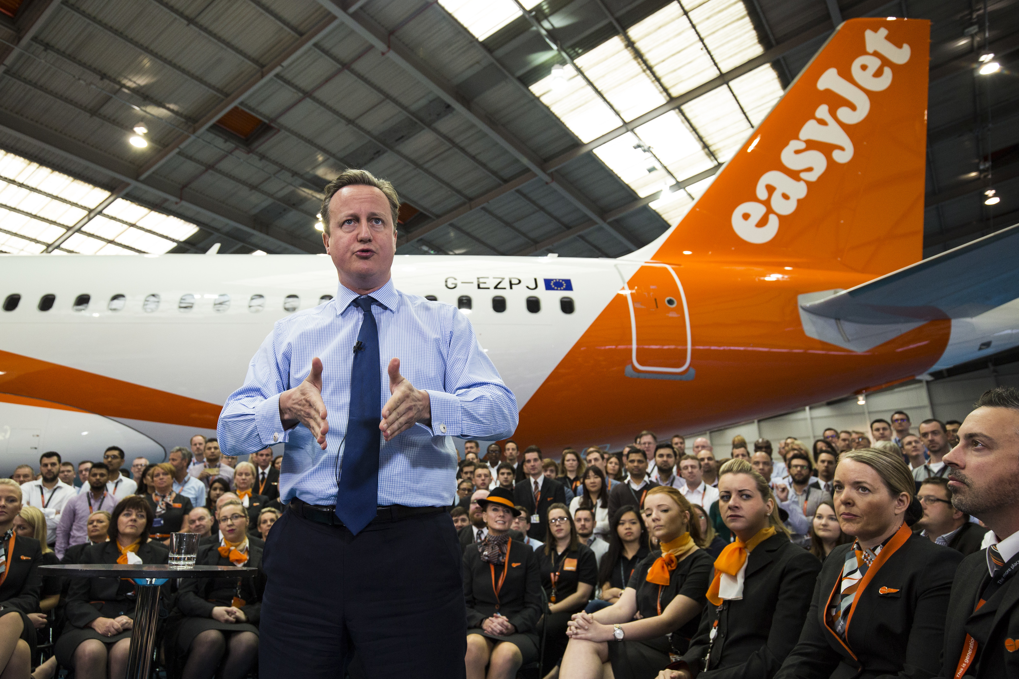 Prime Minister David Cameron delivers a speech to easyJet employees at the aviation company's Luton Airport  hangar.