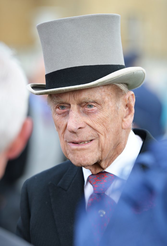 LONDON, ENGLAND - MAY 24: Prince Philip, Duke of Edinburgh greets guests attending a garden party at Buckingham Palace on May 24, 2016 in London, England. (Photo by John Stillwell - WPA Pool/Getty Images)