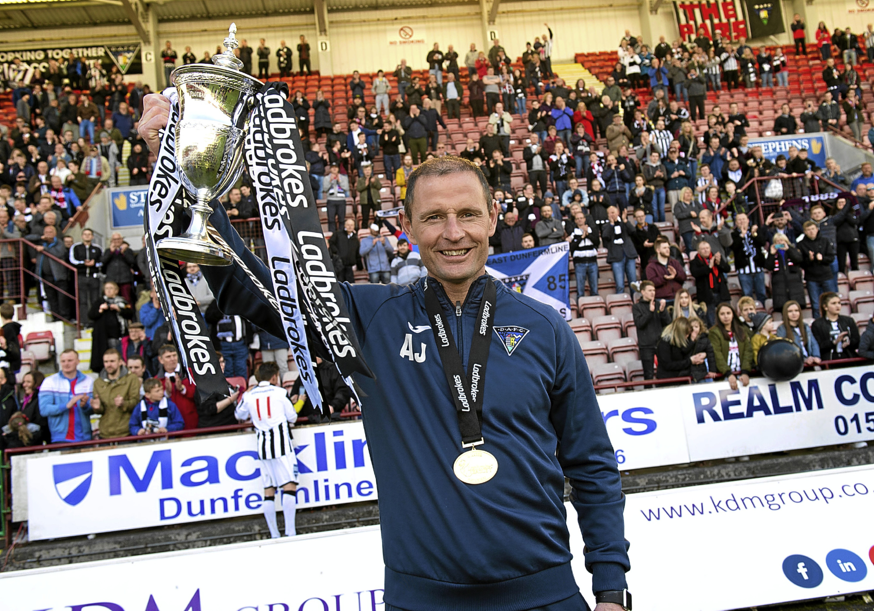 Dunfermline manager Allan Johnston with the Ladbrokes League One trophy