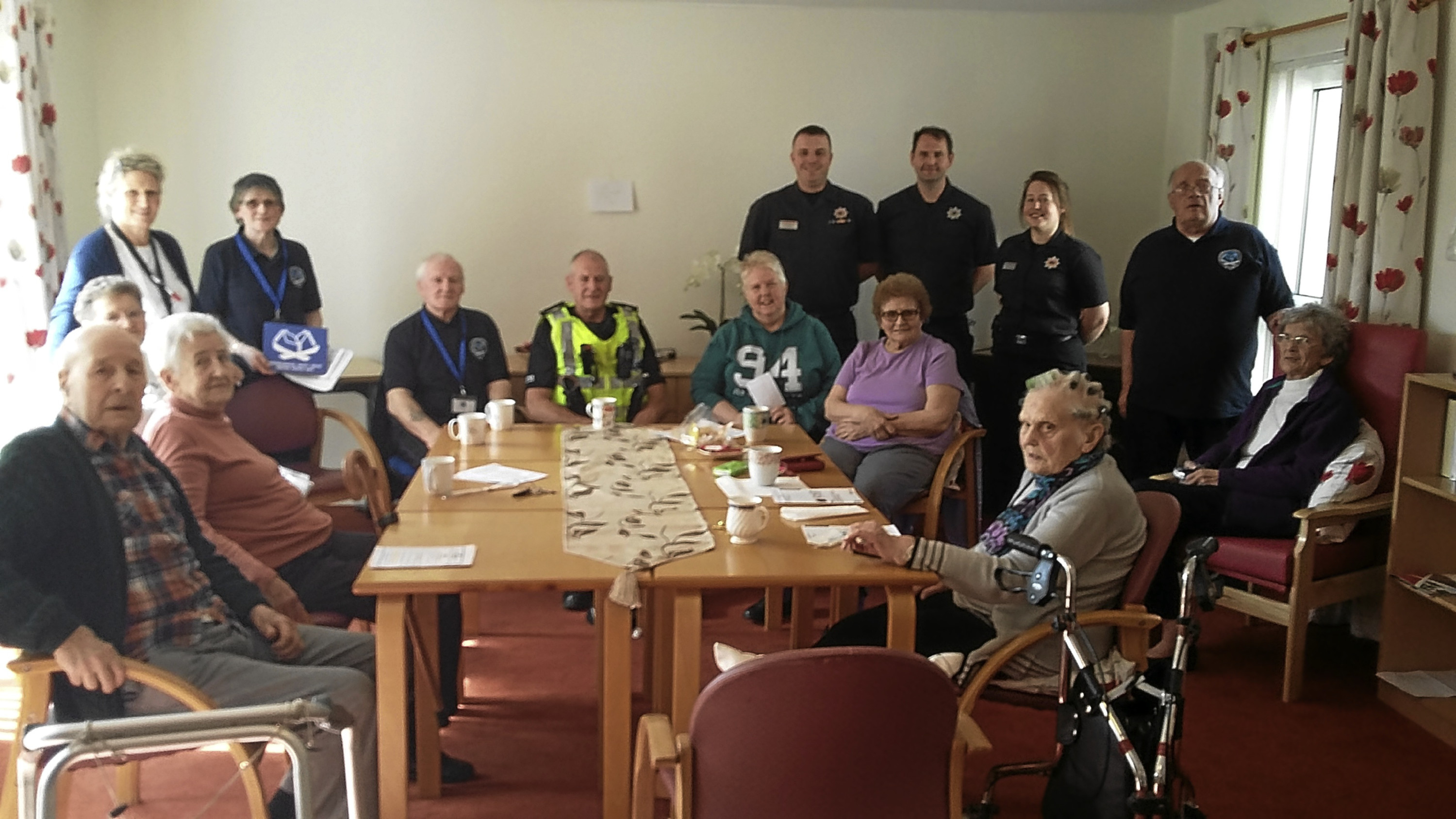 Residents of Burgh House in Leslie were given free home safety lessons by the Scottish Fire and Rescue Service and Police Scotland.
Photo shows the fire service's Red Watch Glenrothes and Glenrothes area neighbourhood safety group with residents.