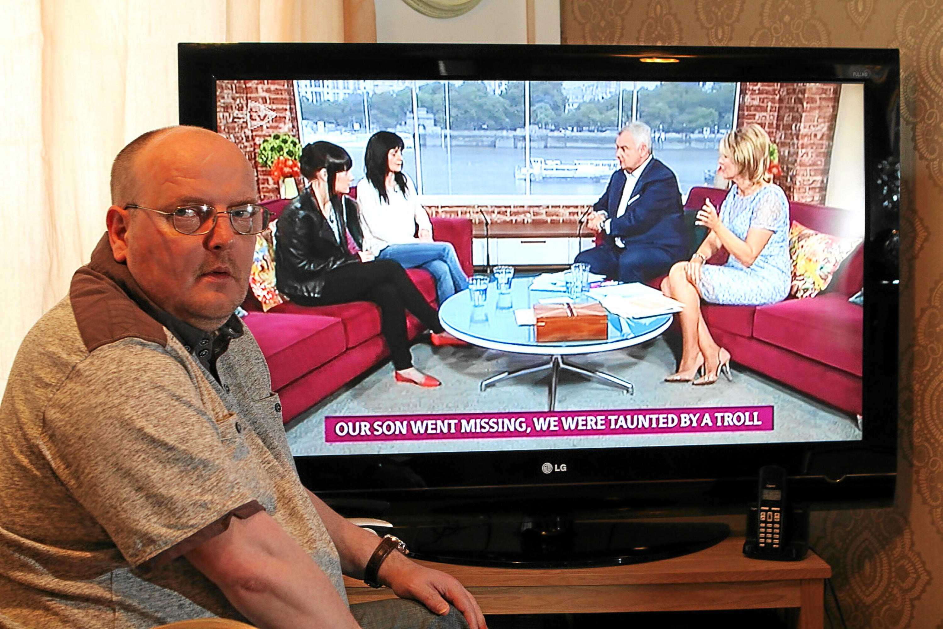 Allan Bryant, with his partner Marie Degan and daughter Amy Bryant on 'This Morning' on the television.