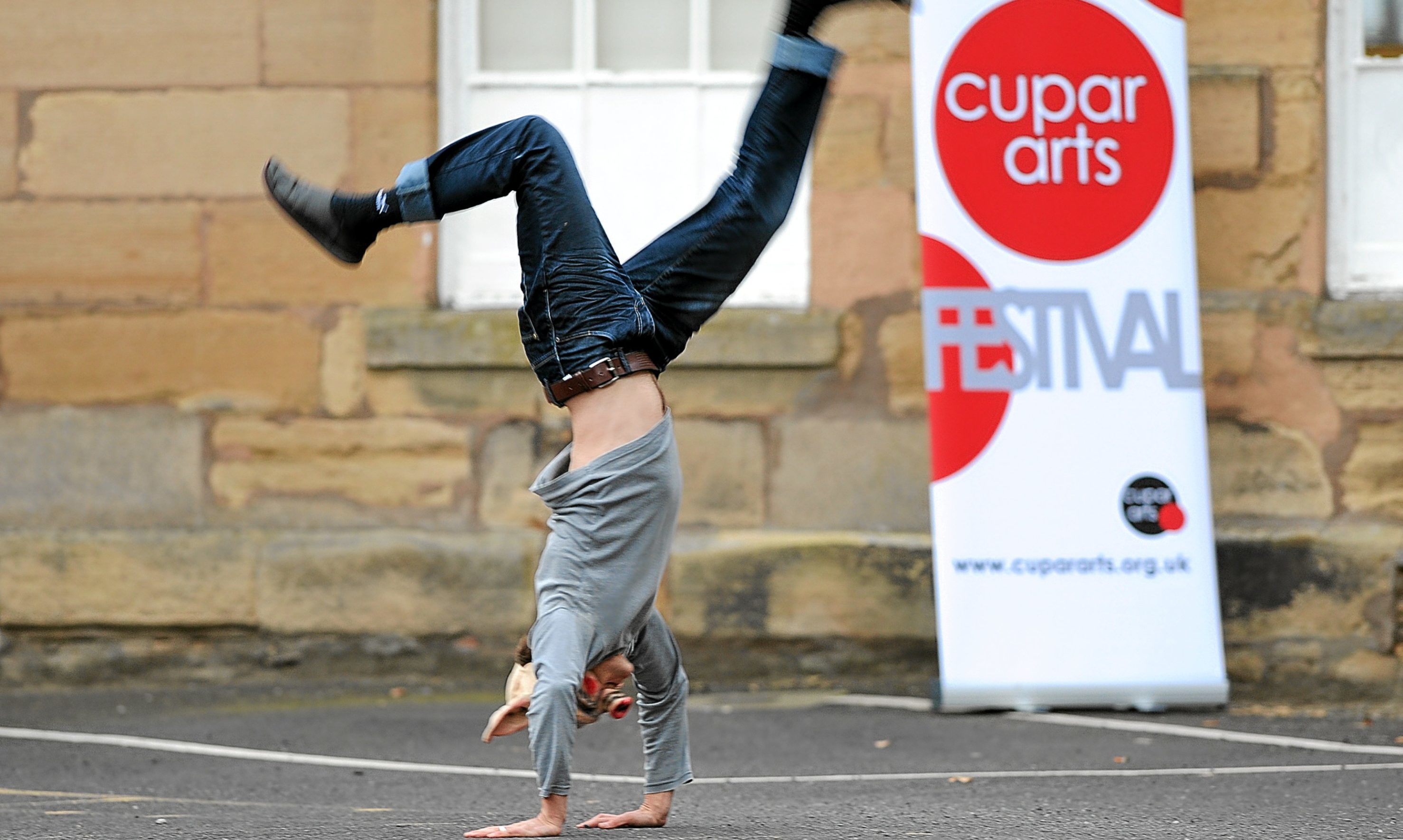Outside the Cupar Arts Festival HQ is artist Anthony Schrag.