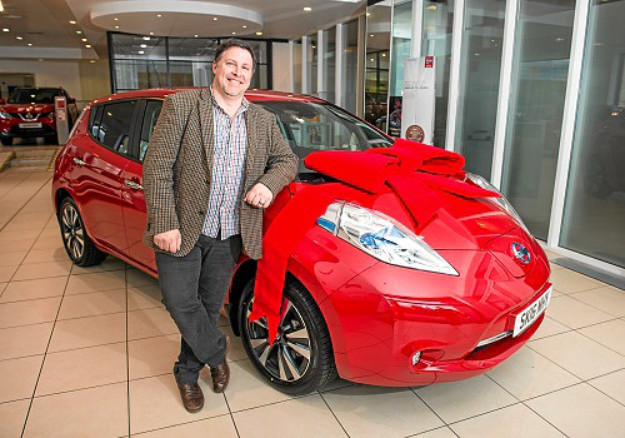 Neil Swanson and the Nissan LEAF he won