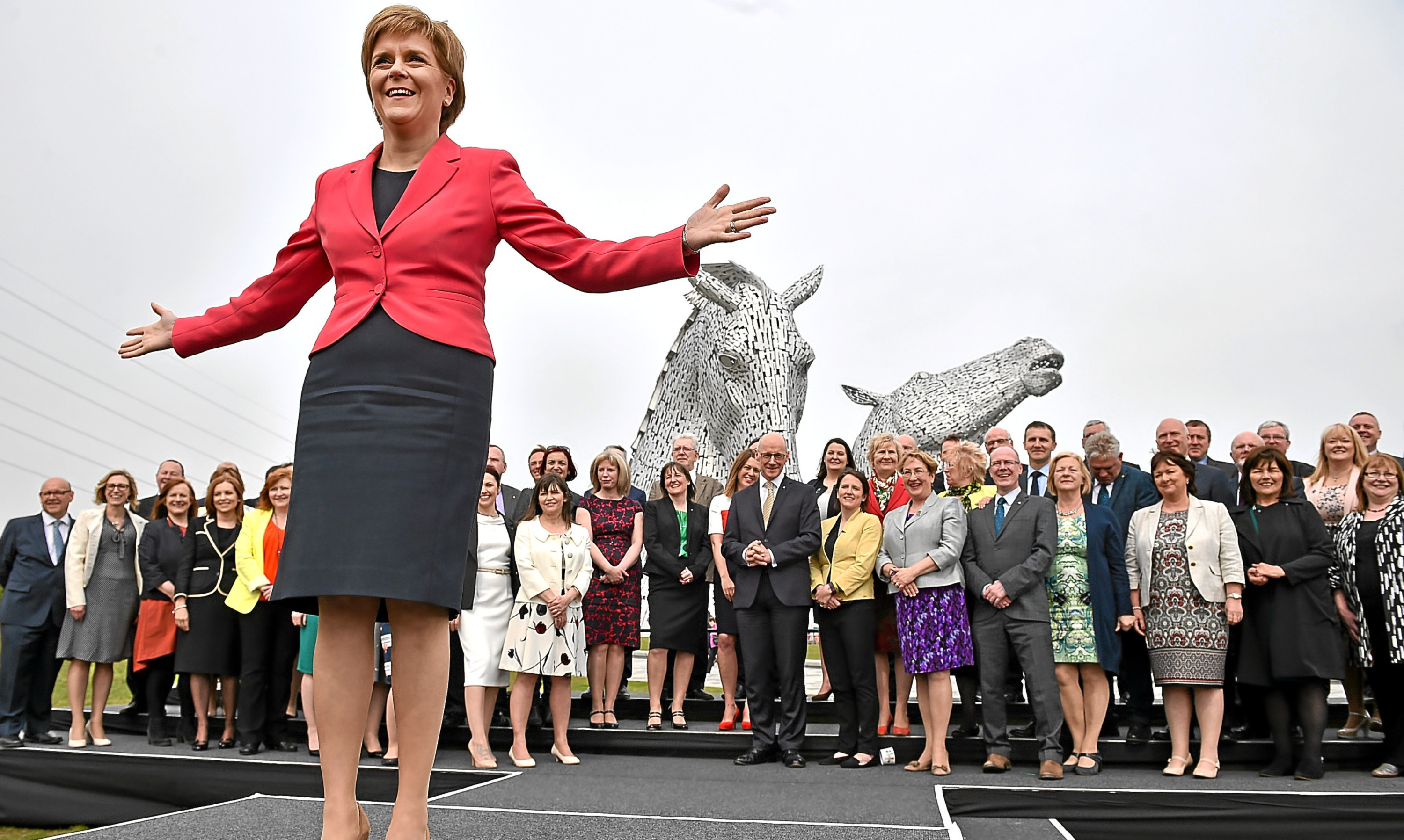 Nicola Sturgeon and SNP MSPs mark election victory at the Kelpies at Falkirk.