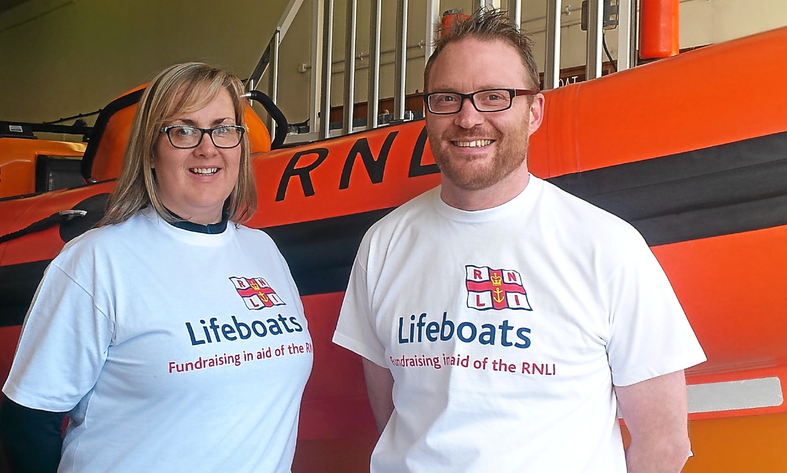 Scout leaders Ava Rennie and Kenny Crosbie walking 180 to raise money for RNLI