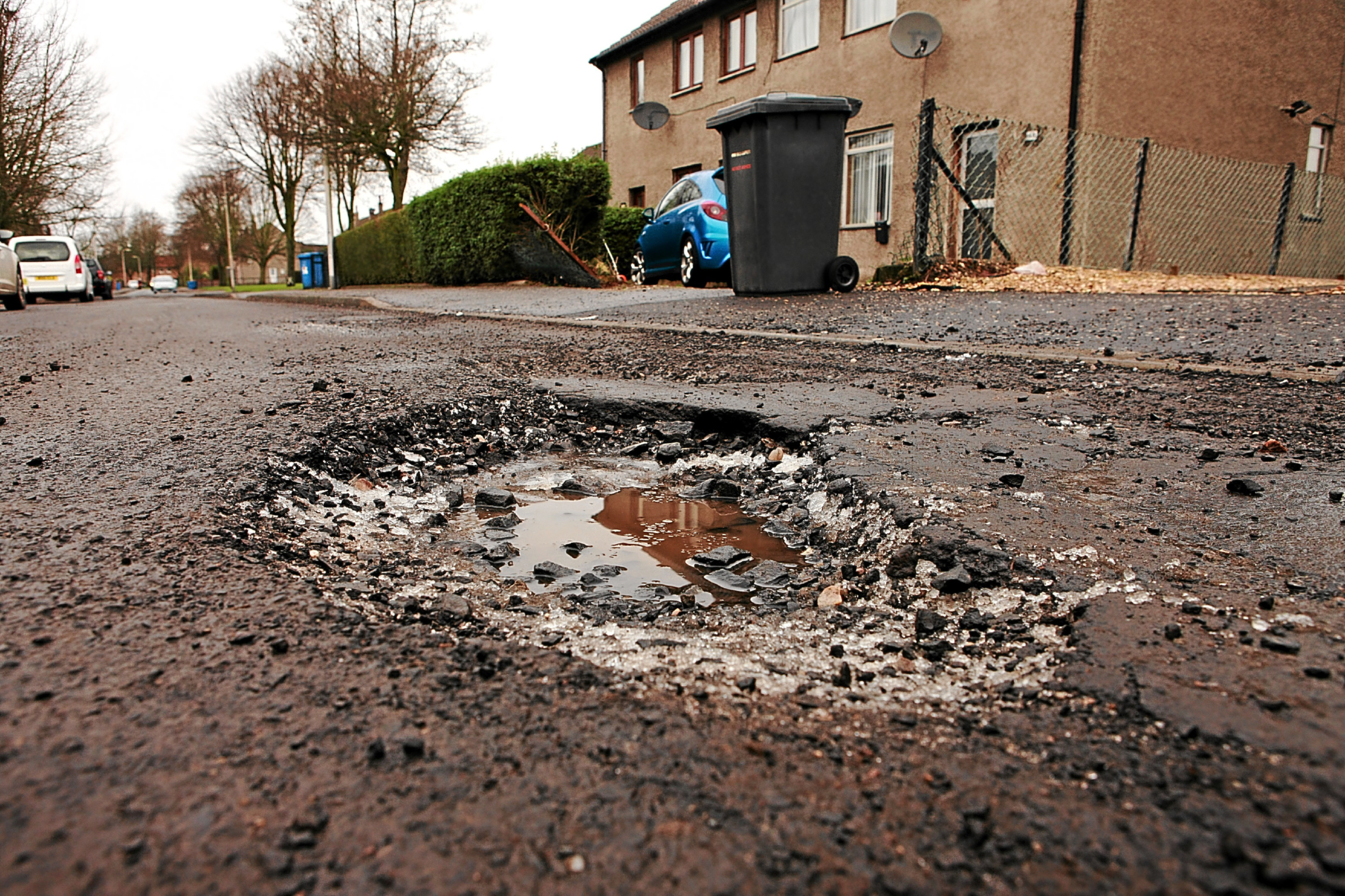 A potholed road