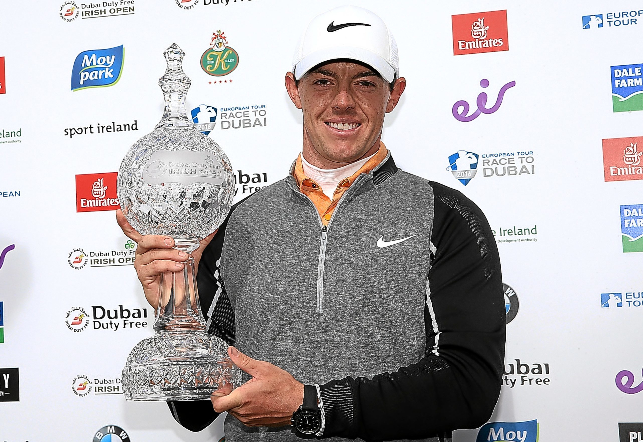 Rory McIlroy poses with the trophy.