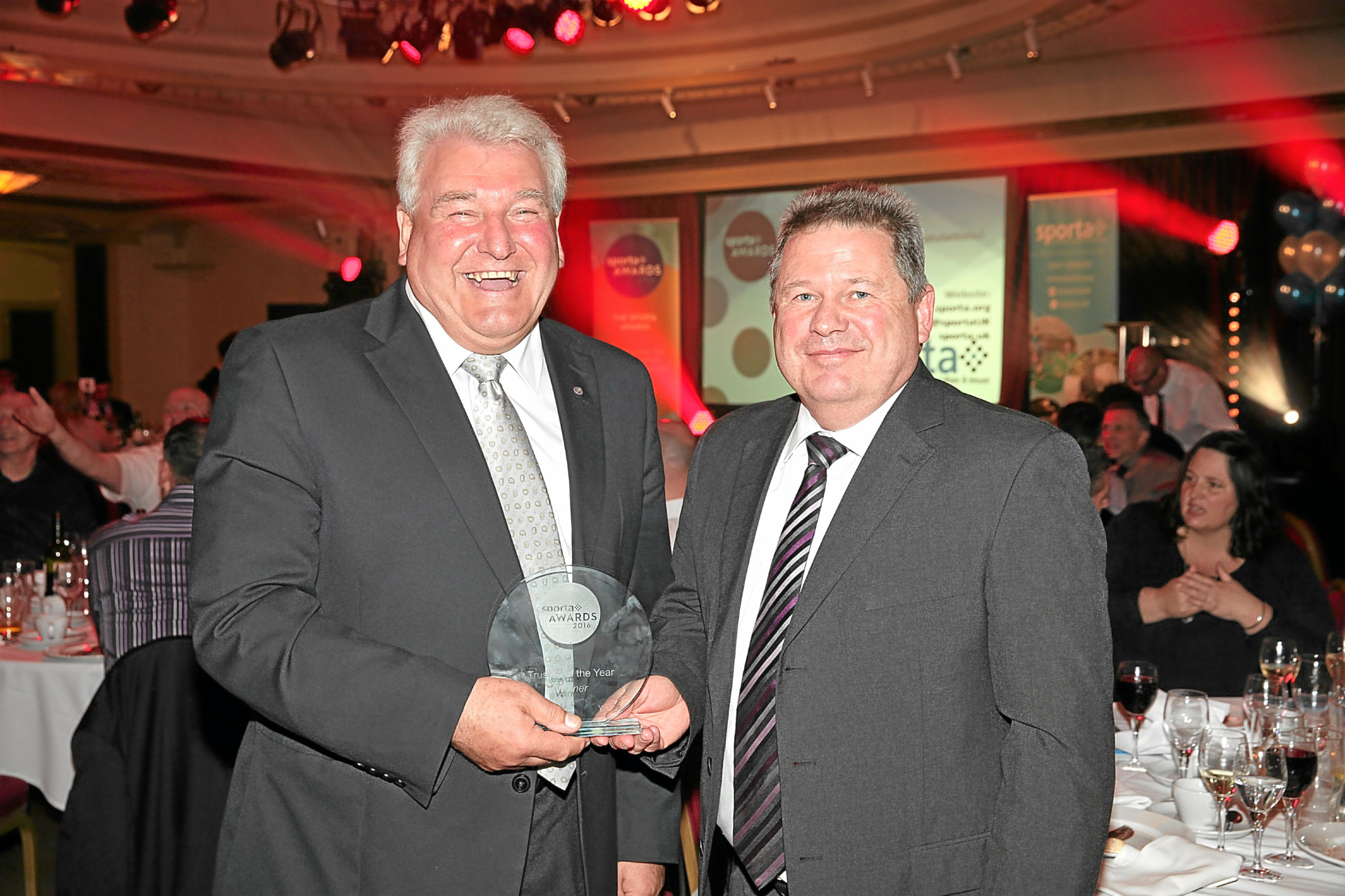 Bill Duncan (left), trustee and chairman of Live Active Leisure collects his Trustee of The Year Award with Jim Moyes, CEO.